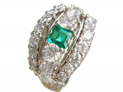 diamond ring studded with an emerald