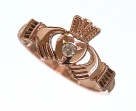 New Rose Gold Claddagh Ring with a round diamond in heart.