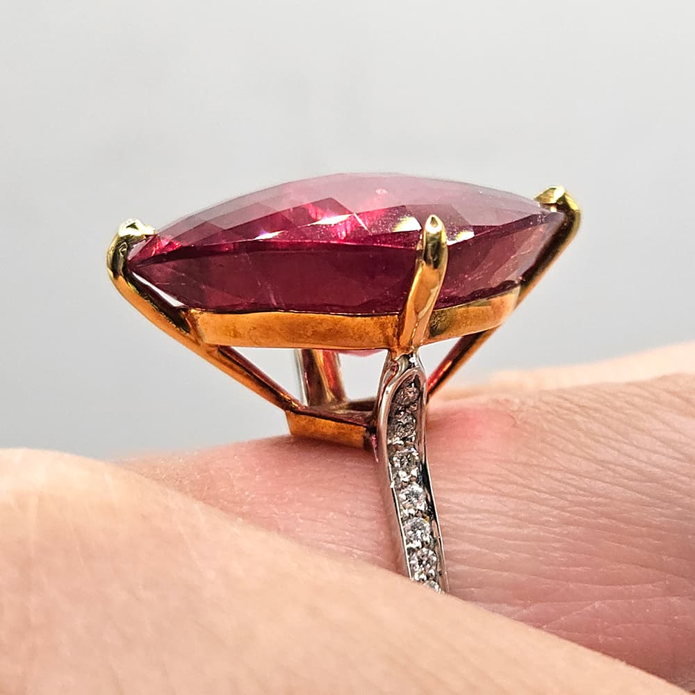Preloved Paolo Costagli rubellite ring in 18k gold with 27ct centre stone on hand side view
